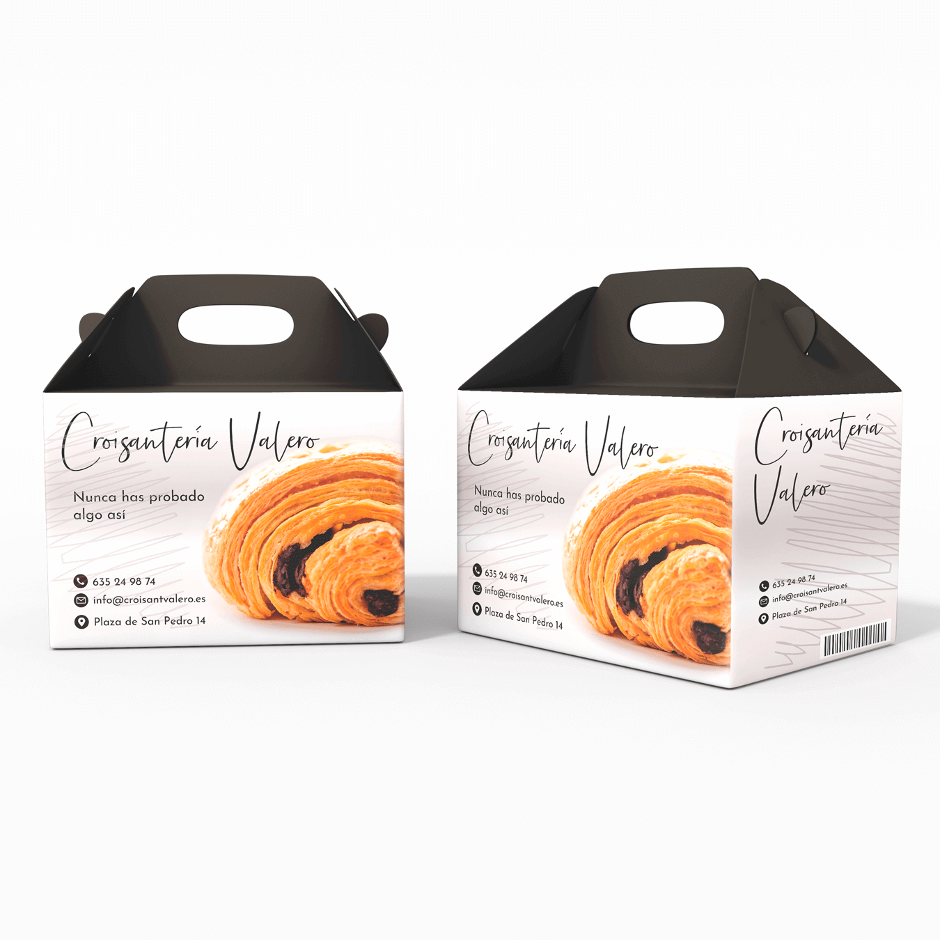Imagen de dos cajas de comida con asa en la parte superior. Aparece la imagen de un croissant relleno de chocolate, el logotipo de la Croissantería Valero y los datos de contacto de la marca. La caja es blanca y la parte del asa es gris ocuro.